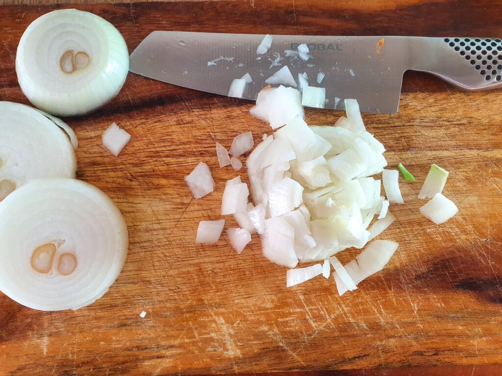 Slow cooker lamb ragu 9 Dicing onion.