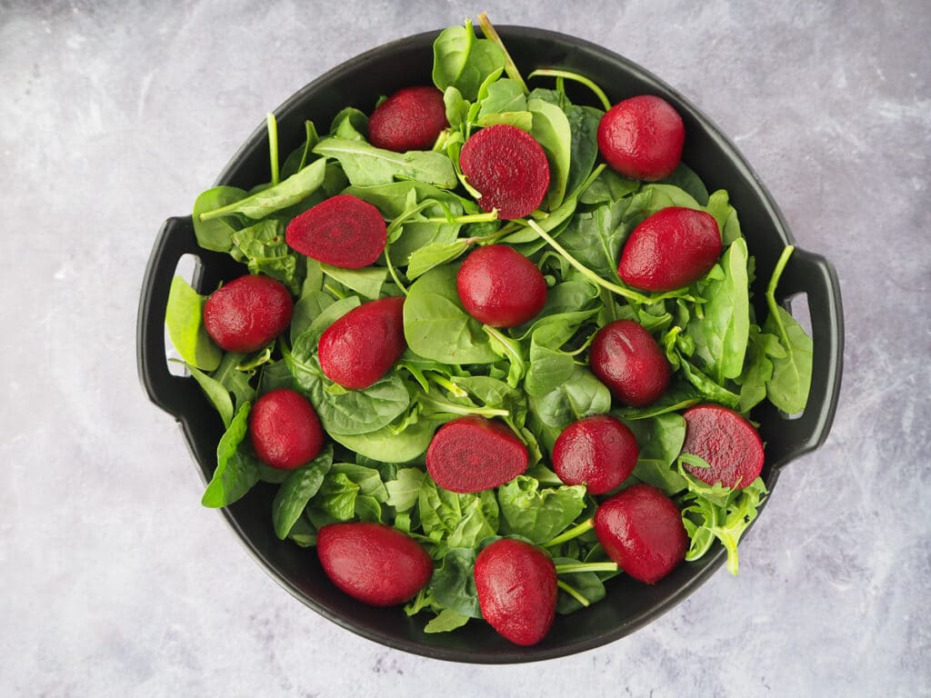 Beetroot salad 9 Adding beetroot to the salad.