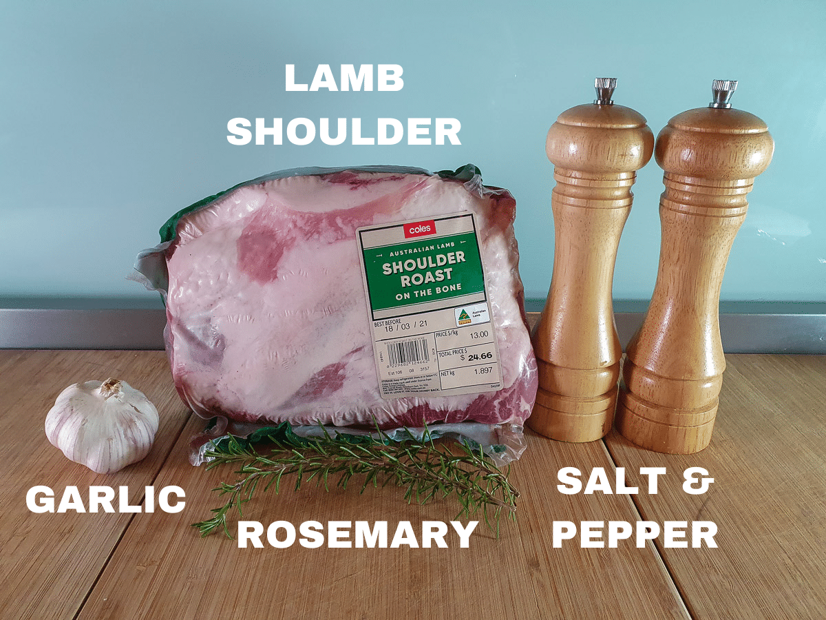 Slow cooker lamb shoulder 2 Slow cooker lamb shoulder ingredients, lamb shoulder roast, garlic, fresh rosemary sprigs, freshly ground salt and pepper.