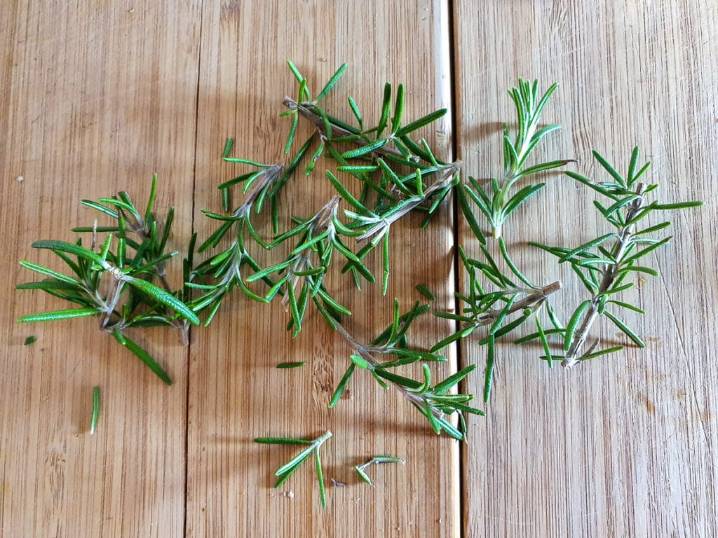 Slow cooker lamb shoulder 3 Short sprigs of chopped rosemary, about ¾ inch ish long, ready to insert into lamb.