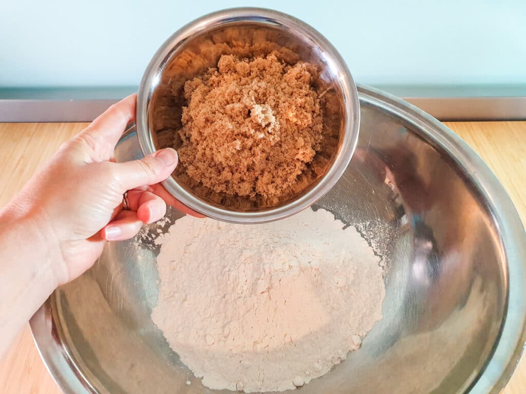 Feijoa muffins 3 Adding brown sugar to flour.