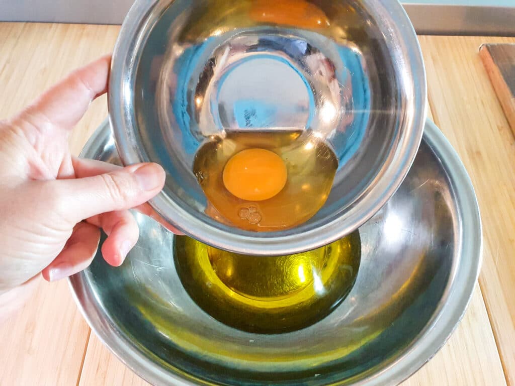 Feijoa muffins 7 Adding egg to oil.