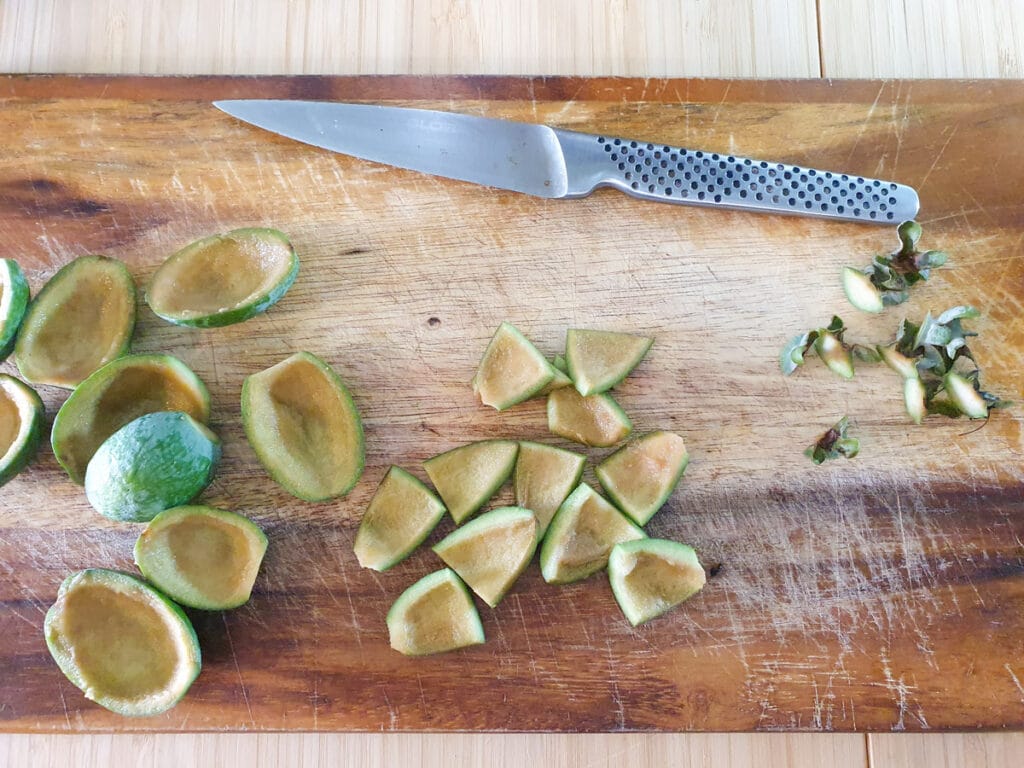 Feijoa syrup 3 Slicing up feijoa skins.