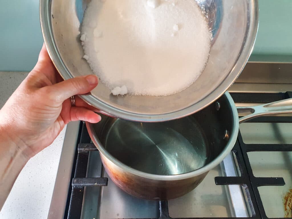 Feijoa syrup 5 Adding sugar to pot.