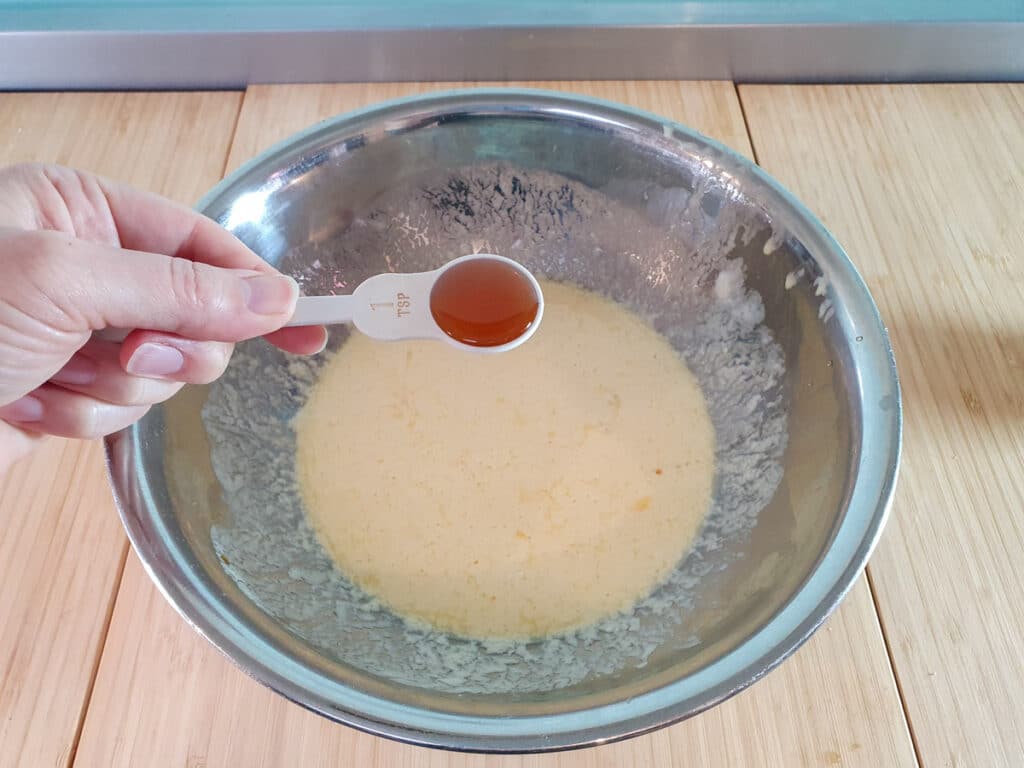 Pear muffins 8 Adding vanilla to wet ingredients.