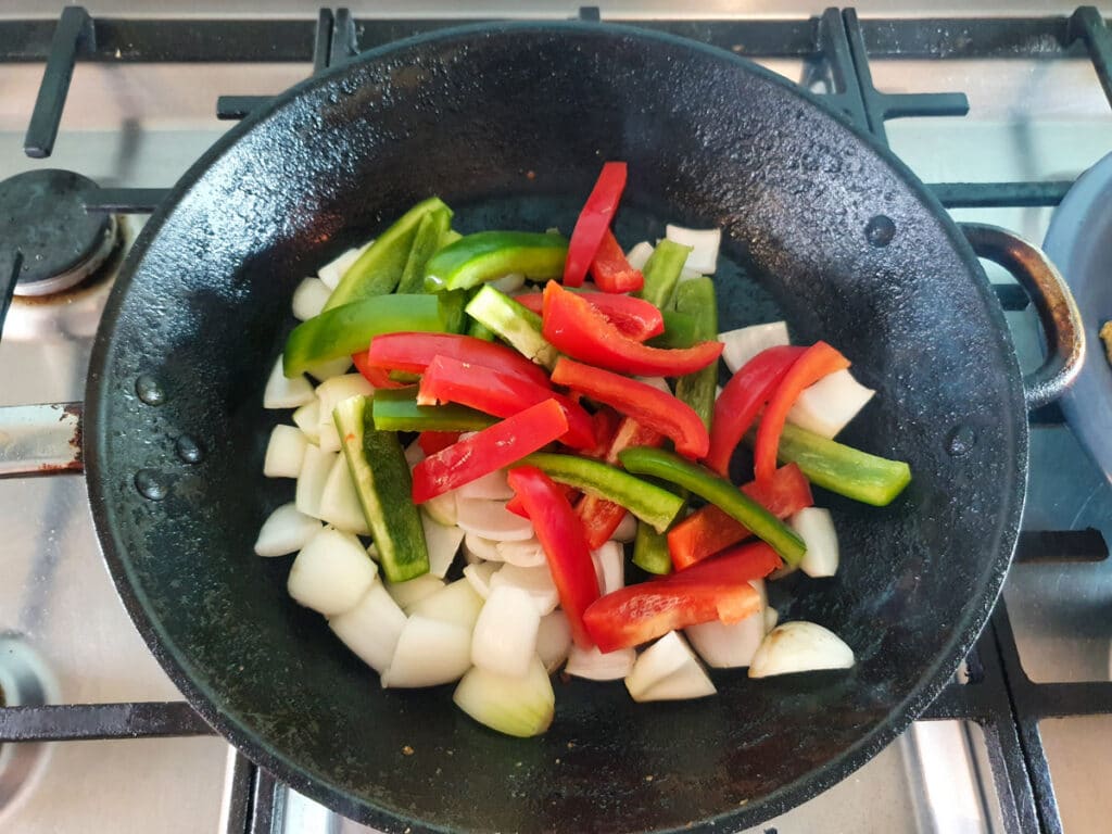 Chilli Chicken Gravy 16 Pan frying capsicum and onion.