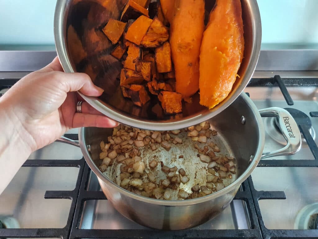 Pumpkin and Sweet Potato Soup 12 Adding the roast pumpkin and sweet potato to the stock pot.