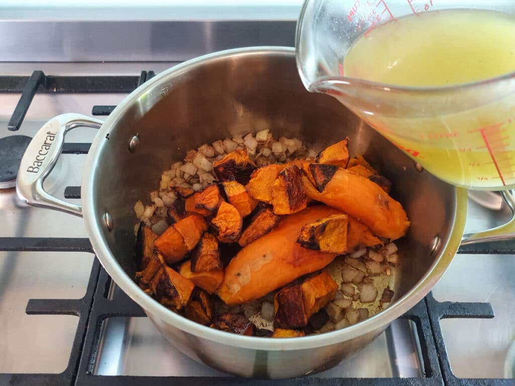 Pumpkin and Sweet Potato Soup 13 Adding the vegetable stock.