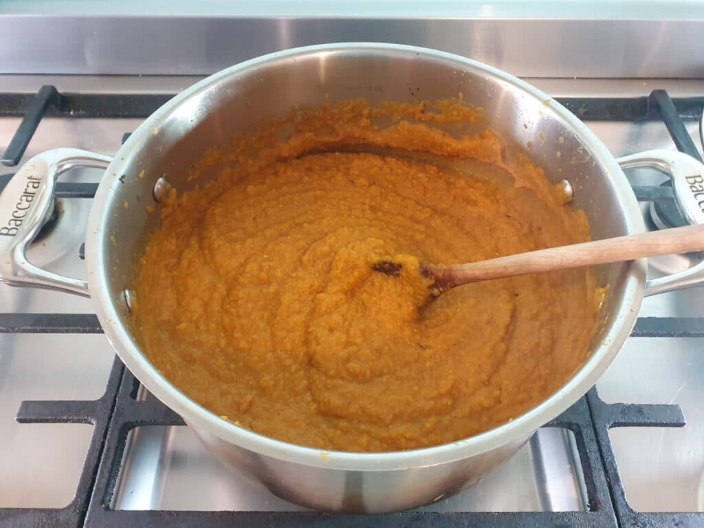 Pumpkin and Sweet Potato Soup 17 Stirring and heating the blended soup.