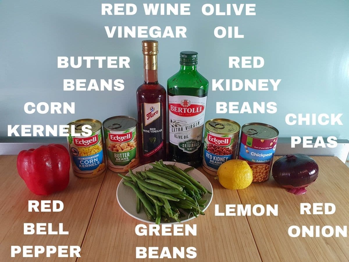 Four Bean Salad 3 Bean salad ingredients, red bell pepper, tin corn kernels, tin butter beans, fresh green beans, red wine vinegar, olive oil, tin red kidney beans, tin chickpeas, fresh lemon, red onion.,
