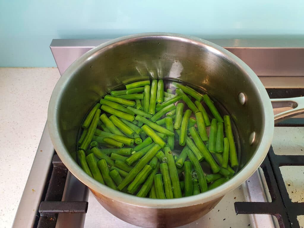 Four Bean Salad 5 Cooking green beans briefly in boiling water.