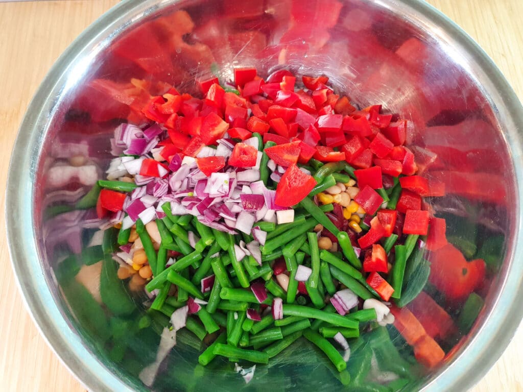 Four Bean Salad 11 Salad in big bowl ready to mix and add dressing.