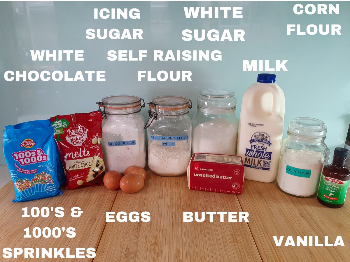 Fairy Bread Lamingtons 2 Ingredients: hundreds and thousands rainbow sprinkles, white chocolate melts, icing sugar, eggs, self raising flour, unsalted butter, white sugar, milk, corn flour, vanilla extract.