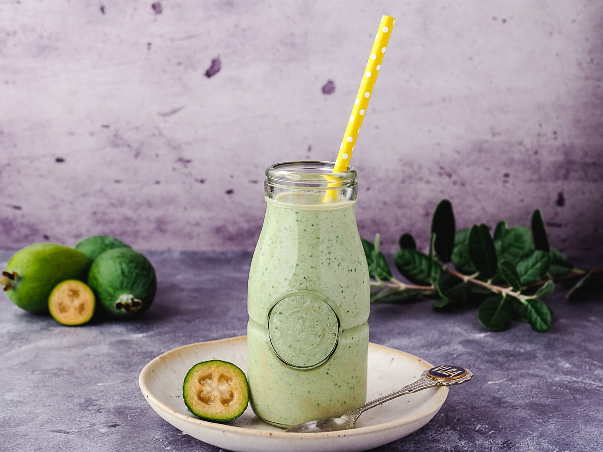 Feijoa Smoothie 6 Feijoa smoothie with straw.