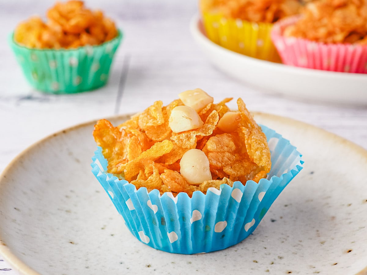 Honey Joys 3 Honey joy on a plate with honey joys in background.